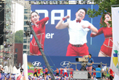 Die Straßen von Gangnam füllen sich mit Anfeuerungsrufen für die WM