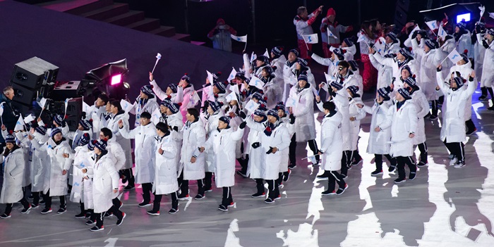 Bei der Eröffnungszeremonie der Olympischen Winterspiele 2018 in PyeongChang marschieren Süd- und Nordkorea gemeinsam unter einer Flagge. ⓒ Hyoja-dong Studio