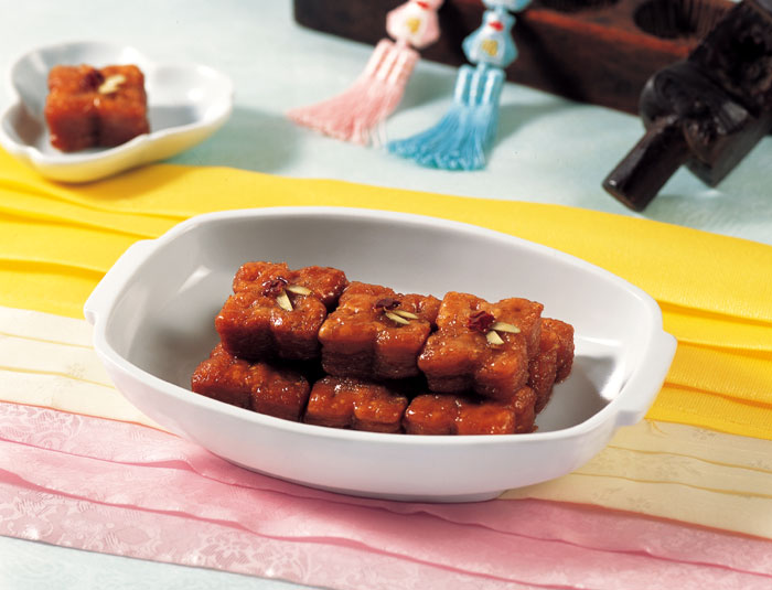 Yakgwa is prepared for feasts, holidays and ancestral rituals. It's a cookie made from a deep-fried flour mixture and honey.