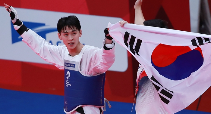 Der Südkoreaner Kim Taehun gewinnt am 20. August eine Goldmedaille bei den Heren -58kg im Taekwondo bei den Asienspielen 2018 in Jakarta und Palembang. ⓒ Yonhap News