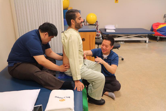 A patient from the UAE undergoes rehabilitation after receiving surgery in Korea last year to remove a tumor in his thoracic vertebrae.