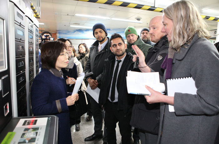 A Danish delegation visits the U-Library, an automated library kiosk, at Seoul National University Station on Line No. 2 in Gwanak District on January 9. . 